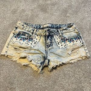 Karma Blue acid wash jean shorts with lace and embroidery
